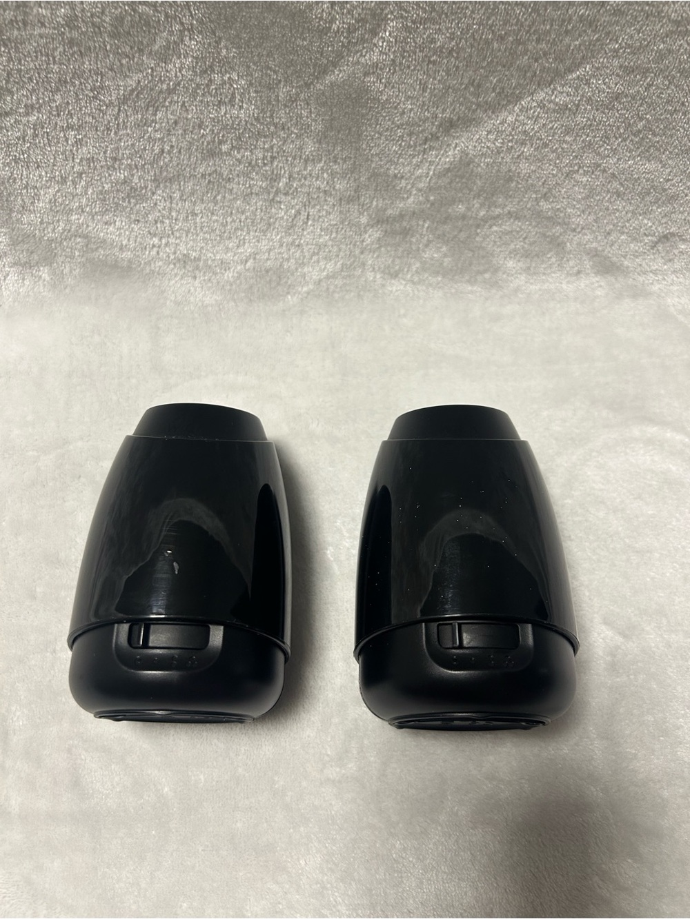 2 black Air Wick Essential Mist diffuser